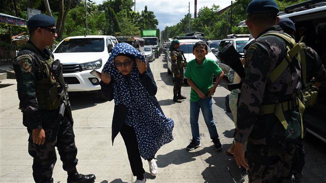 Pejuang Filipina Terkait Islamic State (IS) Kuasai Marawi, Sandera Pastor dan Staf Gereja Katholik