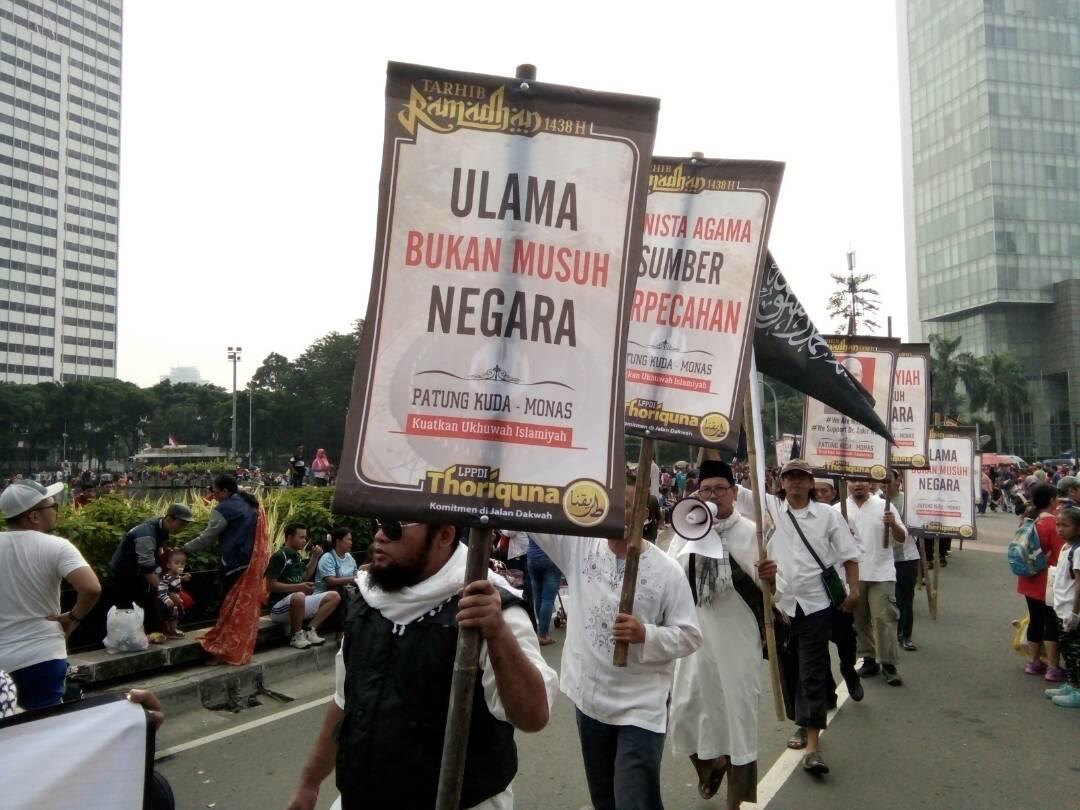 Kampanye Tolak Kriminalisasi Ulama di Car Free Day Jakarta